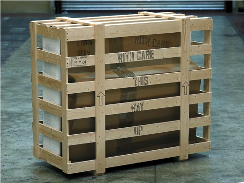 Piano in shipping crate